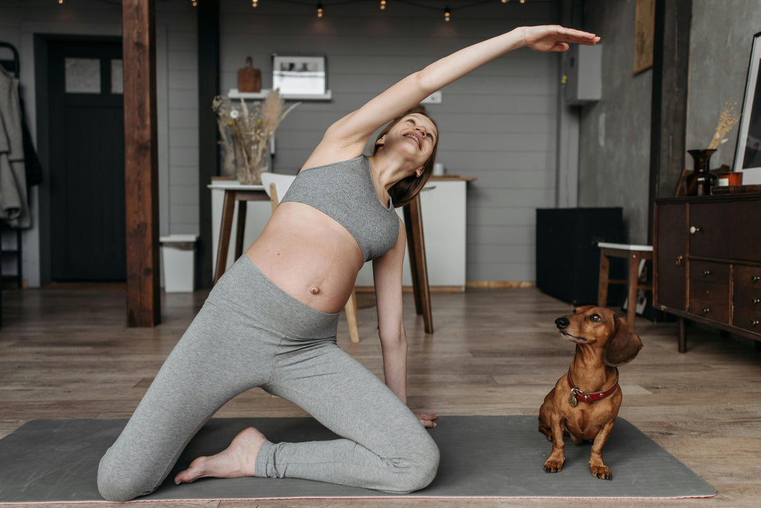 Photo of a Woman in Gray Activewear Doing Aerobics