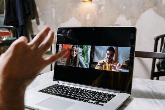 A Man Having a Video Call on His Laptop