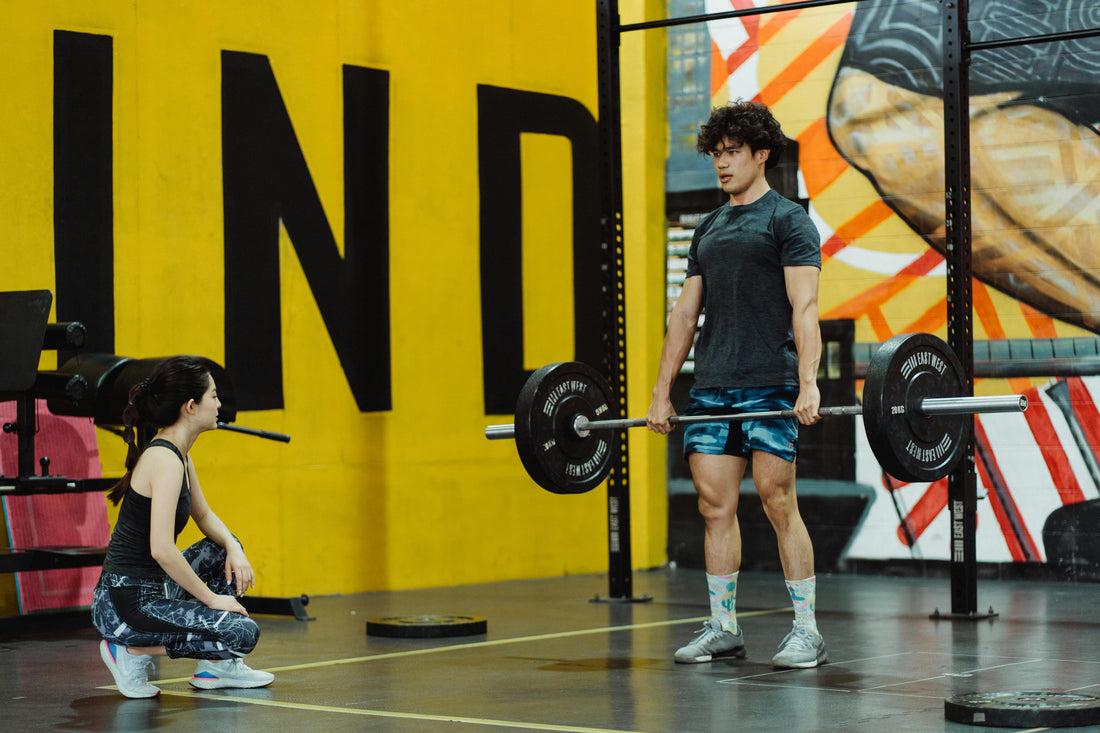 Young Man Lifting a Barbell