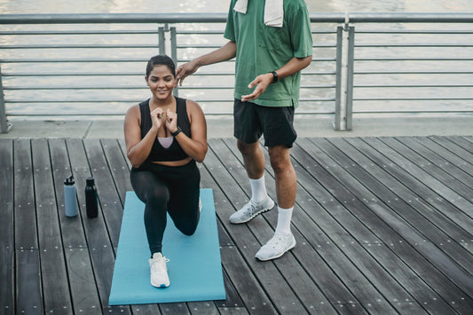 Woman Exercising on a Yoga Mat